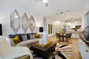 Open floor plan living room with view into the kitchen