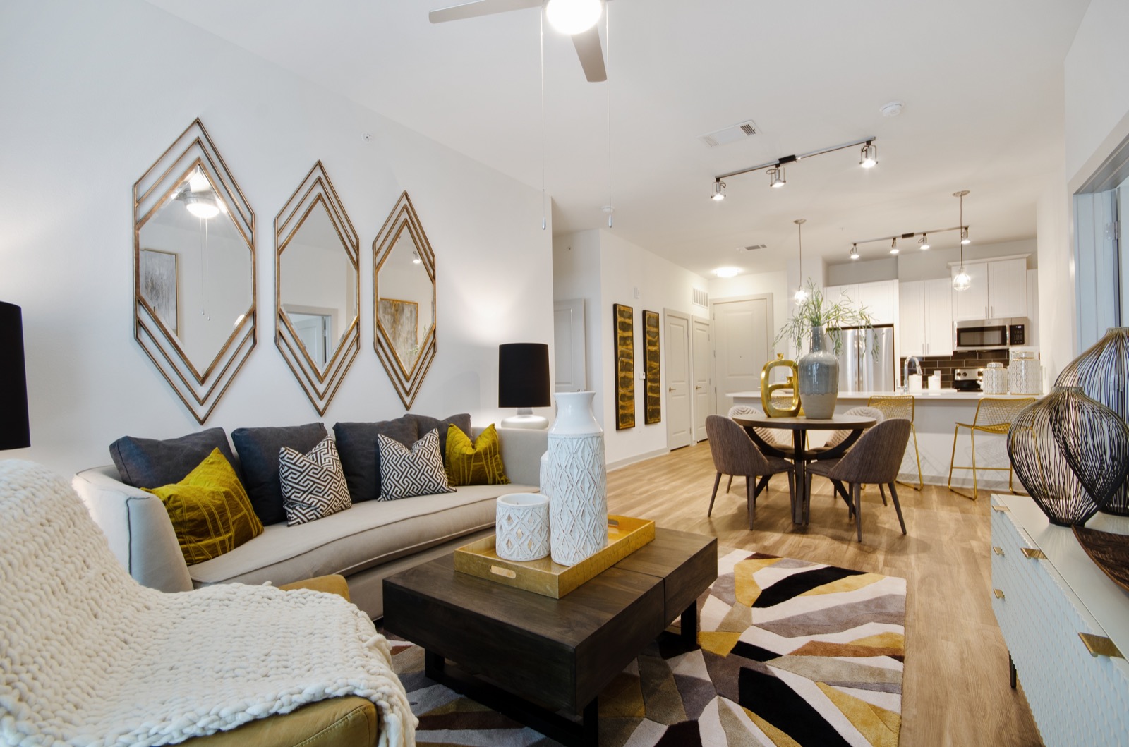 Open floor plan living room with view into the kitchen