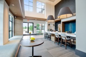 Community lounge with tables and booths