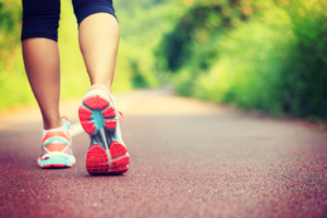 Woman running on a trail