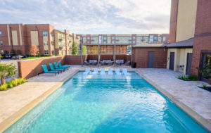 Pool with tanning ledge and deck seating